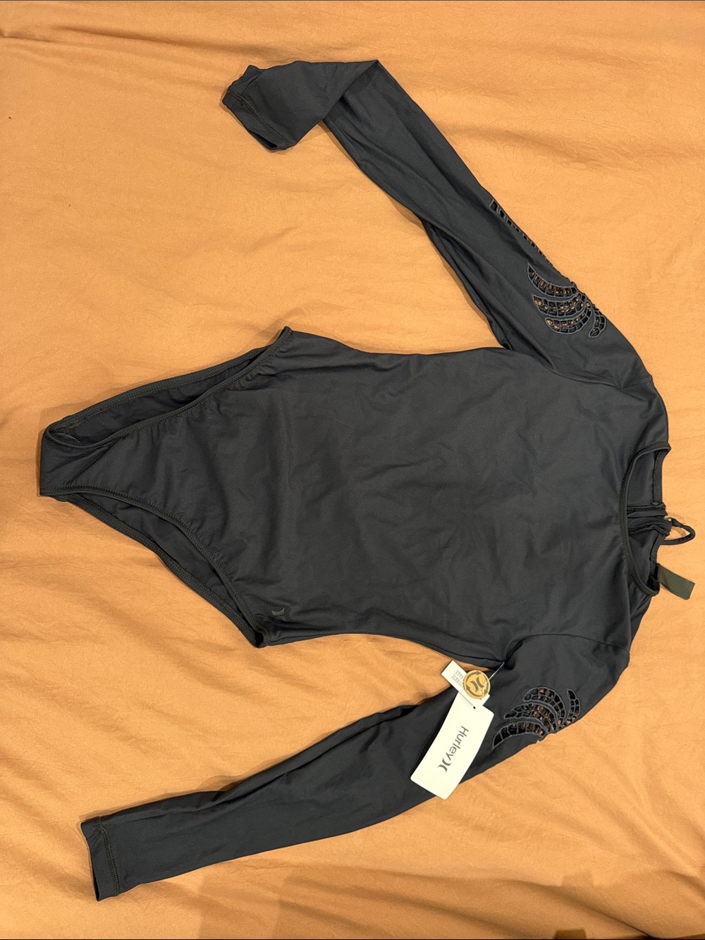 Hurley Black Long-Sleeve One-Piece Swim Suit with Laser Cut Sleeve Detail